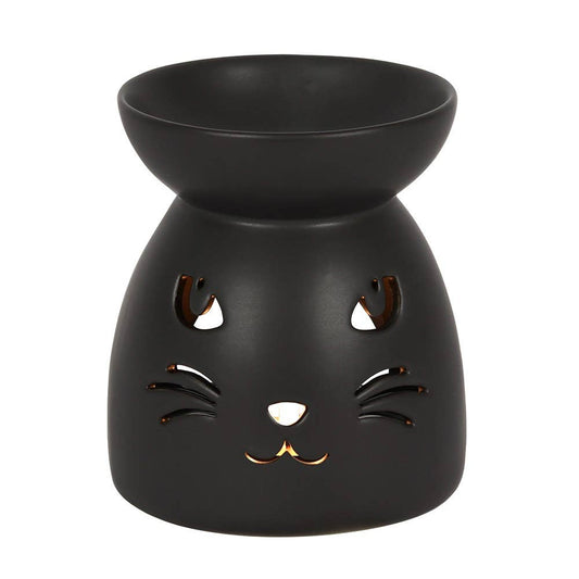 A black ceramic oil burner with a design resembling a cat's face.