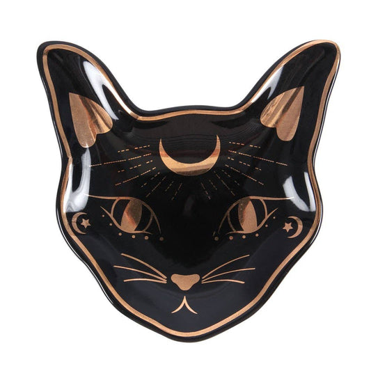 A black ceramic trinket dish with gold accents in the shape of a cat's head.
