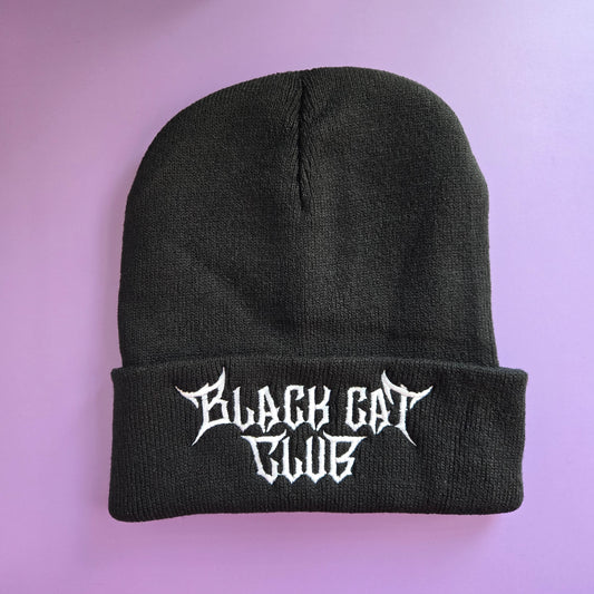 Black beanie with 'Black Cat Club' logo embroidered in white on the cuff.