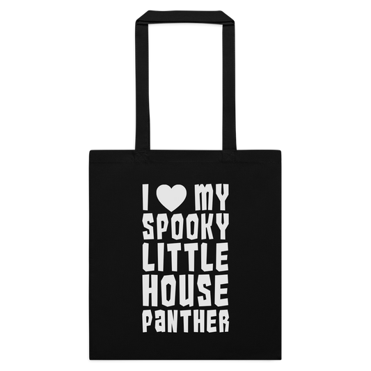 A black canvas tote bag with two black handles, featuring a white graphic print that reads 'I [heart] MY SPOOKY LITTLE HOUSE PANTHER' on a plain white background.