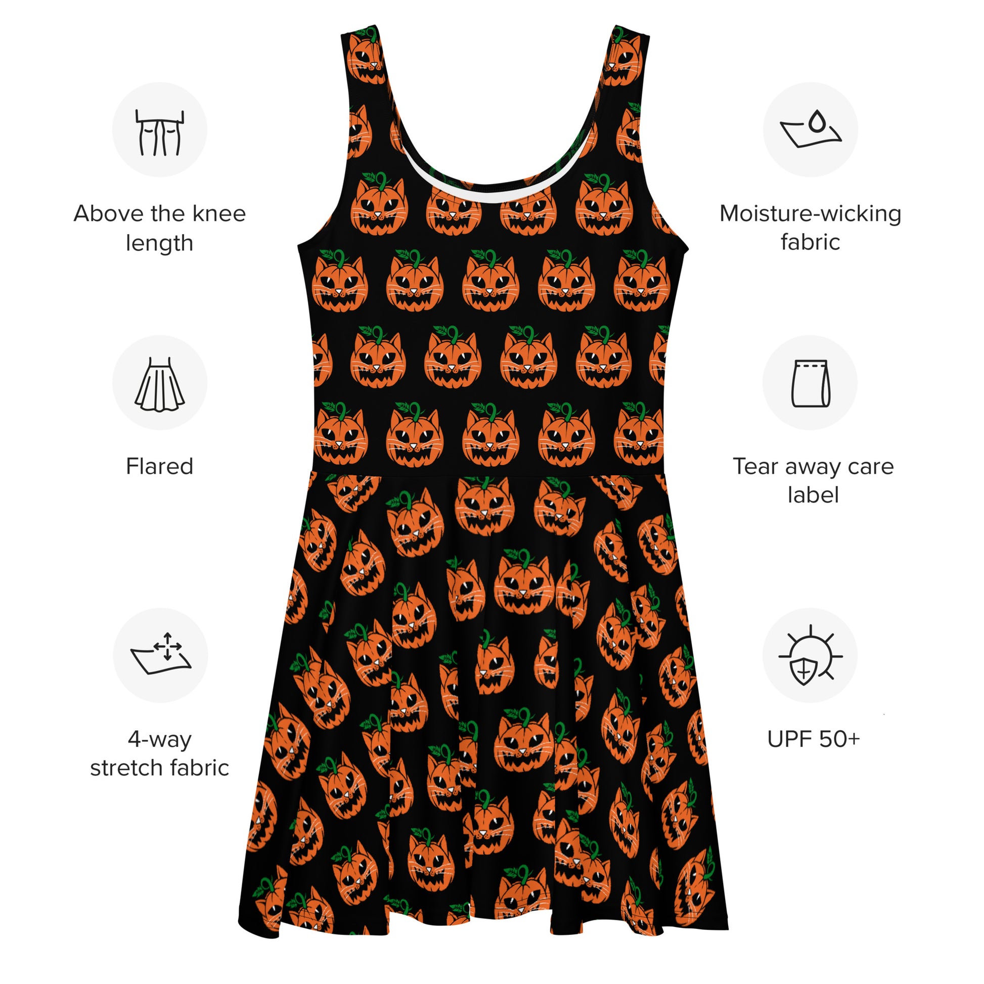 Skater dress, black with repeating pattern of a fierce cat faced orange jack o lantern with green vine top.