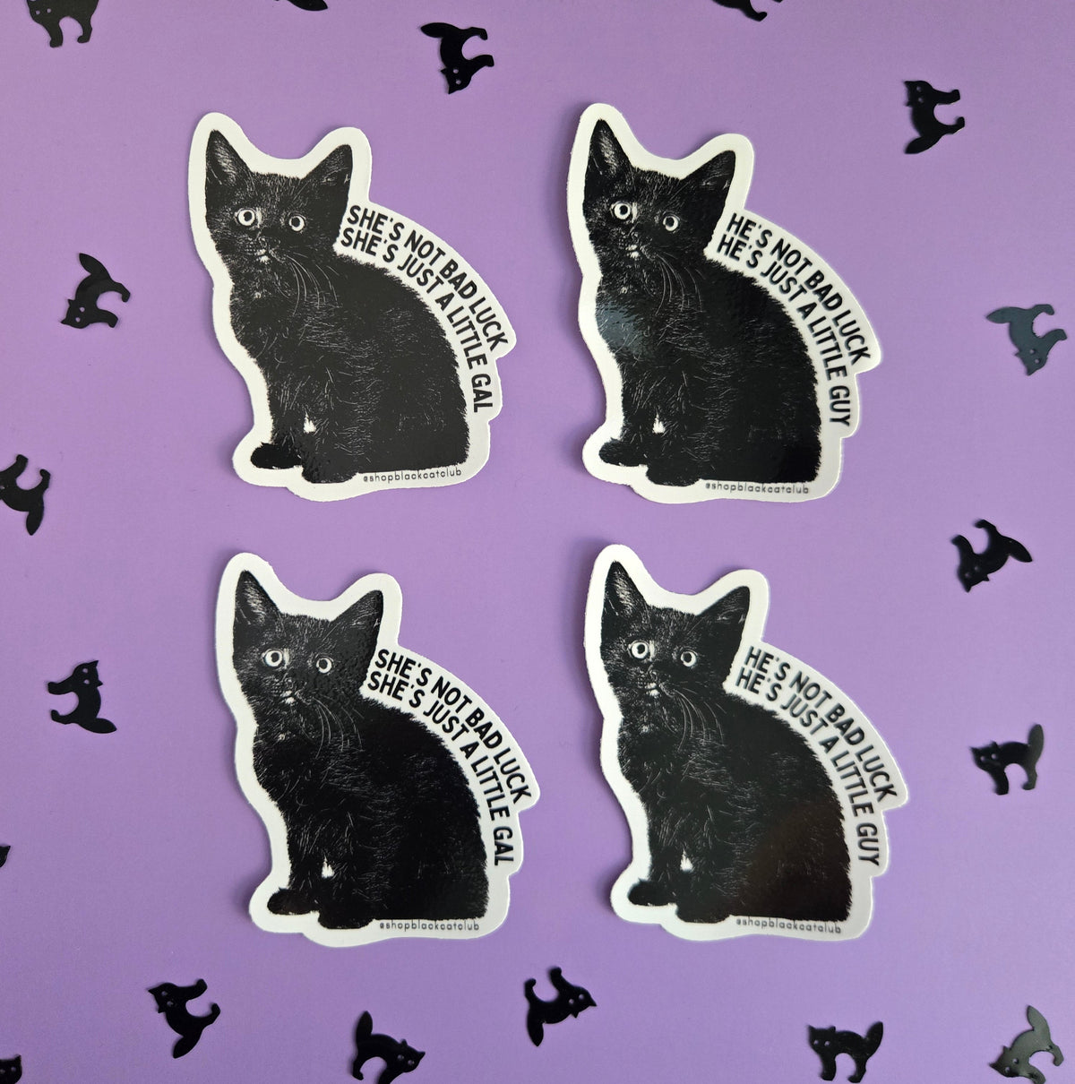 Four die-cut stickers featuring a black cat with white text reading 'SHE'S NOT A bad luck she's just a little gal' arranged on a on a lavender background with small black cat silhouettes.
